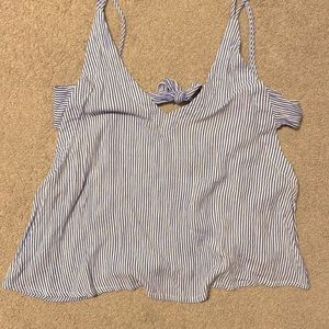 Blue and white striped tie back, open side tank top